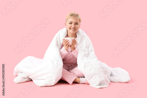 Young woman with cup of cof...