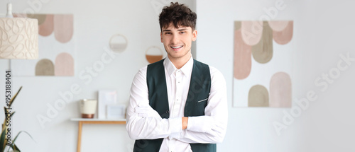 Male waiter smiling in rest...