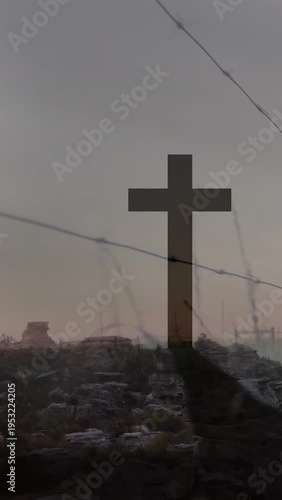 Cam panning right, dark cross overlay holding center, barbed wire shifting, revealing haze for film