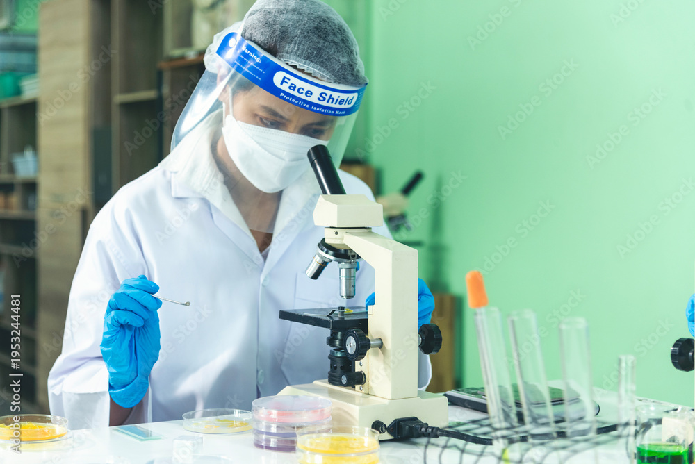 Fototapeta premium Scientist man holding chemical test glass tube testing science laboratory. Doctor clinic healthcare lab technician diagnosis sample. Asian man scientist working vaccine test medical biochemistry lab