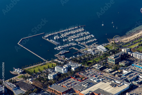 Canvas Print Aerial view of coastal foreshore parklands and walking paths alongside the ocean
