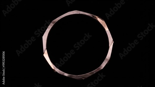 Rose Gold Faceted Metal Bracelet on Black Background Luxury Jewelry
