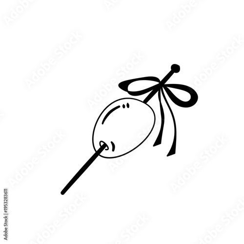 olive garnish on skewer with ribbon 