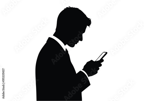 Silhouette of a businessman in a suit intently looking at his smartphone, in a modern, professional setting