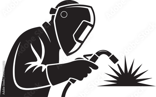 Black silhouette of welder wearing protective gear welding metal