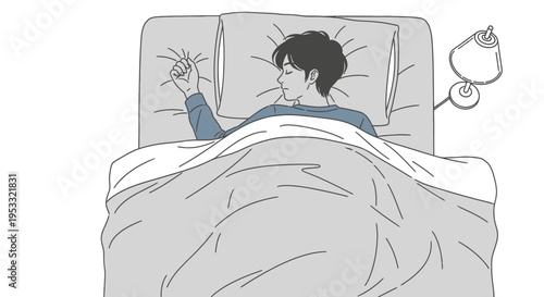 person lying in bed awake at night.