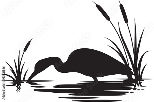 Black silhouette bird wading in water with cattails