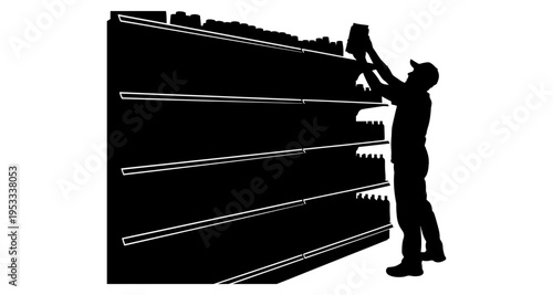 Silhouette of a store worker stocking shelves with products in a retail environment