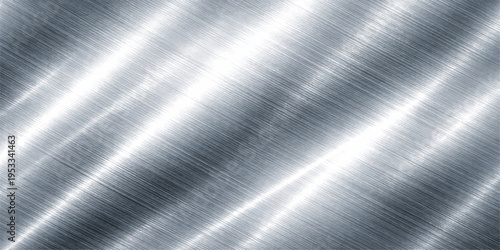 A polished silver brushed metal texture background with a shiny stainless steel surface and industrial grey aluminum plate pattern featuring light chrome reflections on a textured metallic sheet