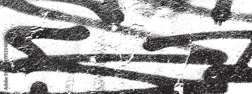 Abstract black graffiti marks and splatters on textured white background, urban street art graphic, spray paint