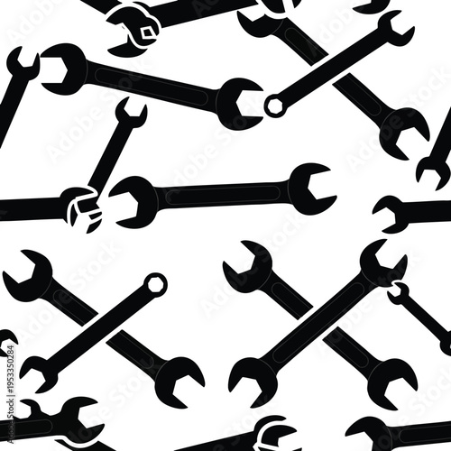 Assorted black wrenches scattered in a repeating pattern on a white background