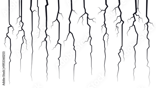 Vertical black cracks spreading across plain white surface creating textured pattern representing damage, earthquake, or architectural failure.