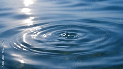 Sunlit water surface with ripples