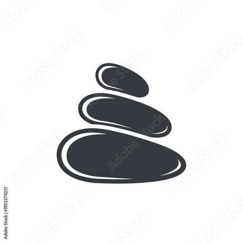 Stack of smooth dark grey stones for spa and wellness.