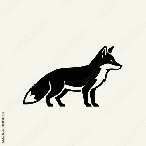 Elegant Black Fox Silhouette Standing Gracefully on Light Background.