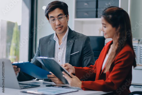 Group of business people and software developers working as a team in office