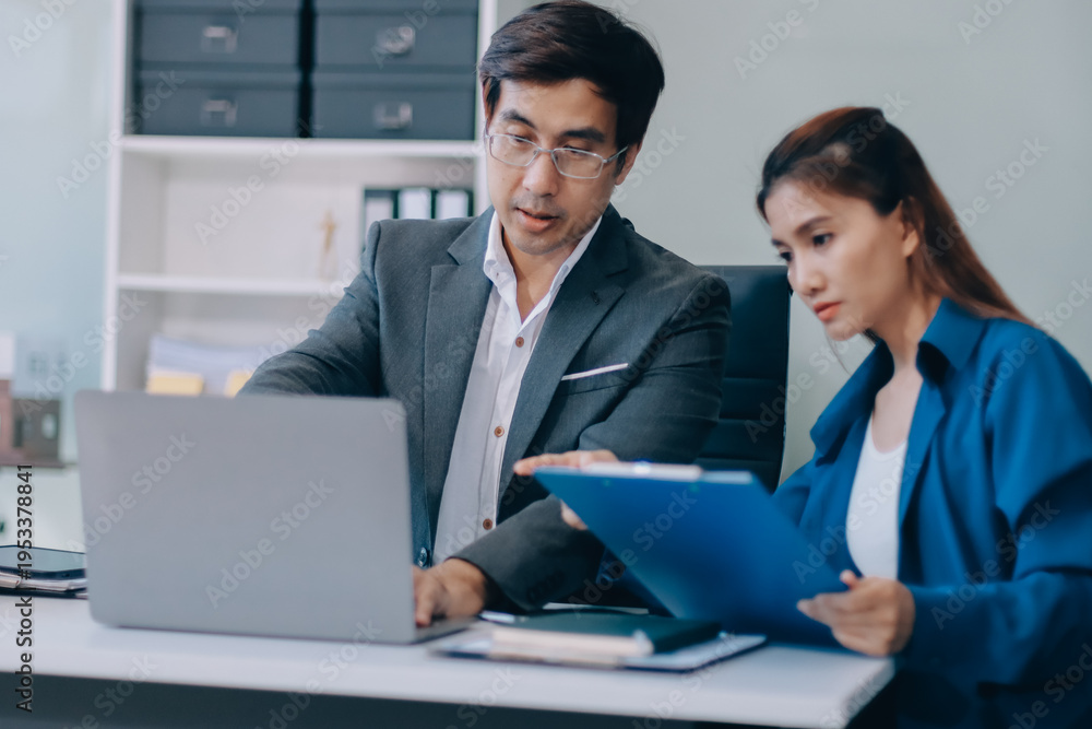 Obraz premium Millennial Asian stressed depressed worried thoughtful professional male businessman female businesswoman employee staff in formal business suit sitting thinking solving problem ideas in office room