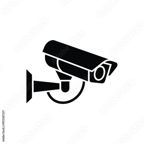 A simple black silhouette of a security camera mounted on a wall