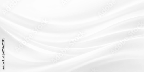 An elegant white silk and satin fabric background featuring soft flowing waves and smooth curves creates a luxury textile drapery design with light grey shadows for a premium wallpaper backdrop
