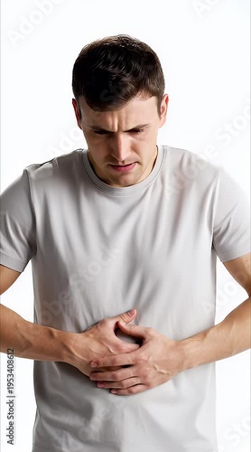 Young Man Expressing Intense Stomach Pain and Abdominal Discomfort