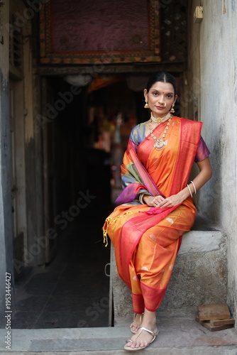 An Indian young woman in a traditional Marathi attire on a Hindu festival. 