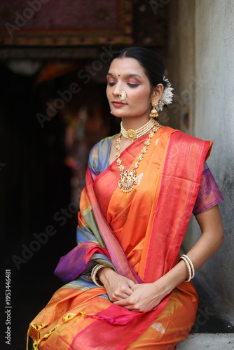 An Indian young woman in a traditional Marathi attire on a Hindu festival. 