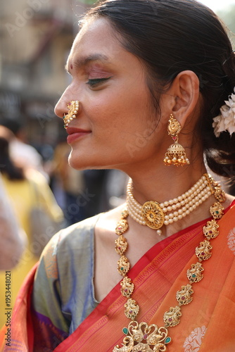 An Indian young woman in a traditional Marathi attire on a Hindu festival. 