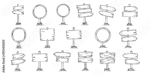 Various directional signs displayed on stands in a row for guidance.