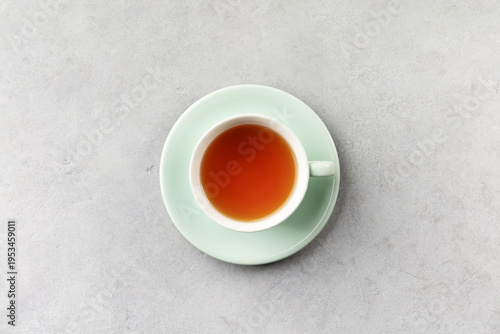 Konstfotografi Minimal Cup of Tea on Mint Saucer Flat Lay with Copy Space