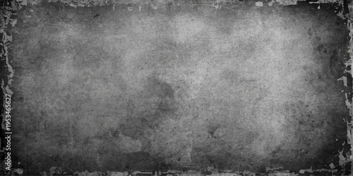 A dark aged metal frame sits against a dirty gray concrete wall texture with a vintage grunge design on an old black textured paper surface