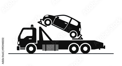 Tow truck carrying damaged vehicle.