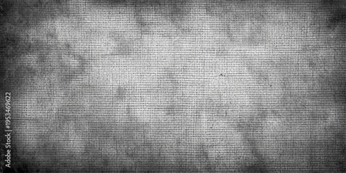 A dark aged grunge metal background with a textured gray stone wall pattern and blank space for a vintage design backdrop