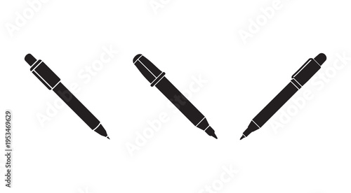 Three black ballpoint pens on white background