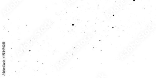 Abstract grainy grunge texture background with fine black grit speckles creating a vintage aesthetic, adding organic depth to minimalist designs.	