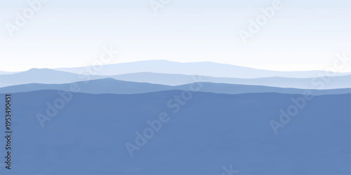 Mountain landscape with clouds over the mountains at sunrise