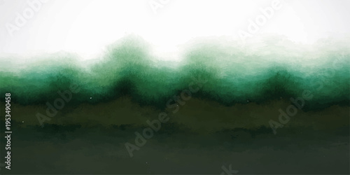 Misty mountain and forest landscape with thick fog drifting through trees under a cloudy sky