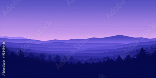 Fotografie Sunrise over misty mountains with fog drifting through the forested valley under