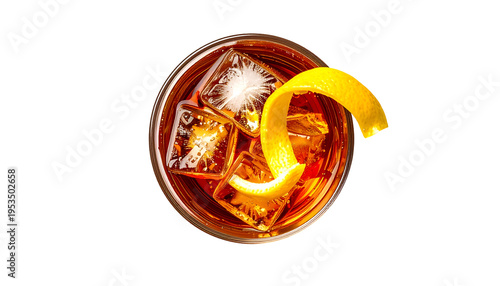 Overhead view of a cocktail in a glass with ice cubes and a curled citrus peel