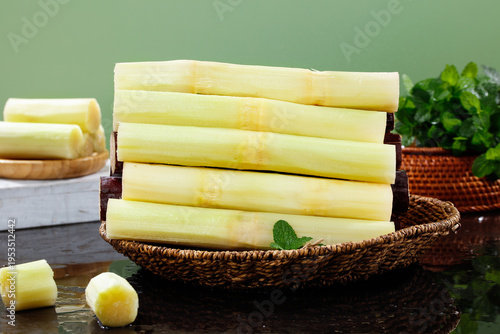 Fresh Sugar Cane Sticks in Wicker Basket - Traditional Guangxi Sweet Fruit Snack