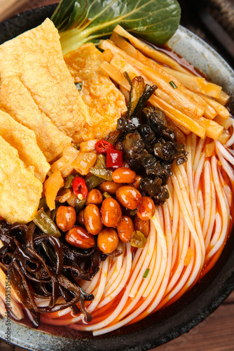 Guangxi Snail Noodle Soup with Tofu Curd Bean Pickled Vegetables Fungus Traditional Chinese Cuisine