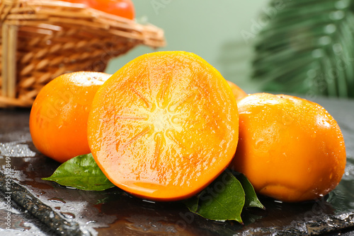 Fresh Guangxi Persimmons with Apple-Like Taste and Crunchy Texture on Stone Surface
