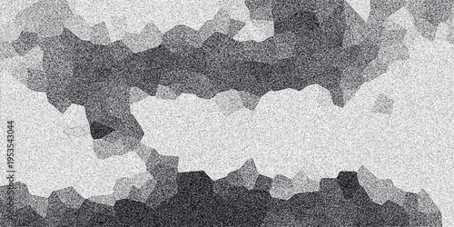 Abstract grayscale mosaic pattern with granular texture and jagged geometric shapes creating a textured background for design and digital art applications