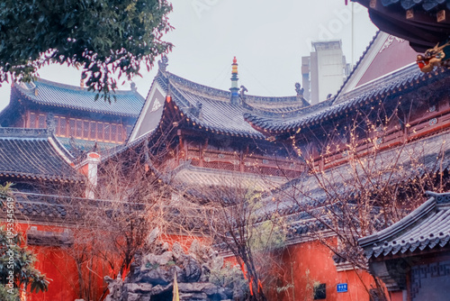 Obraz na plátně Traditional Chinese Temple Courtyard with Red Walls and Glazed Tile Roofs