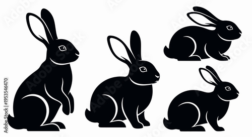Set of five black rabbit silhouettes in various poses, isolated on a white background.