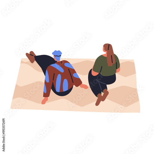 Young friends sitting together on picnic blanket outdoors. People from back, ...