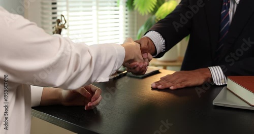 Close up of illegal money exchange between business people during a meeting, representing bribery, corruption, unethical behavior, and violation of law in professional environment.