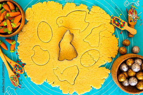 Easter cookie crafting involves creating festive treats by cutting shortcrust dough into traditional shapes like bunnies, eggs, and chicks using special cookie cutters, following detailed traditional 