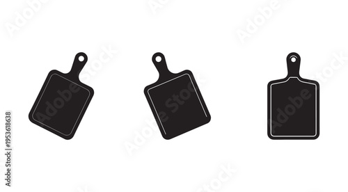 Three black cutting boards with handles on white background for kitchen utensil design  cooking tools  blank boards for food preparation