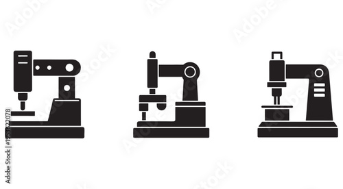 Three industrial robotic arms with drills for manufacturing and assembly  industrial automation and robotics technology