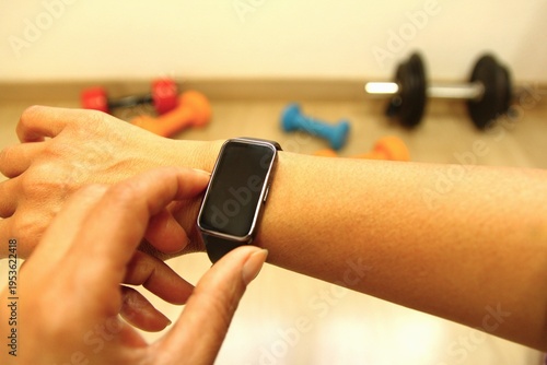 Hands using smart watch for do exercise. photo
